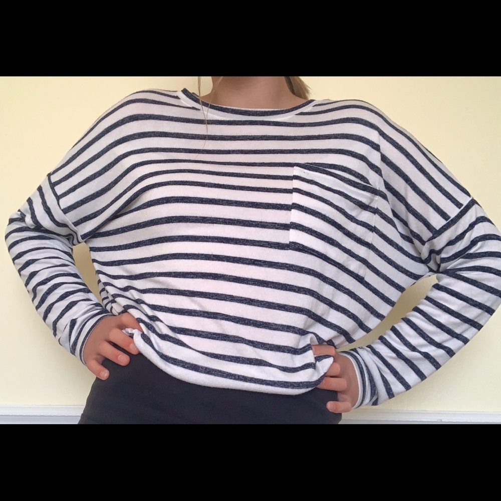 White and dark blue striped long sleeve tee.